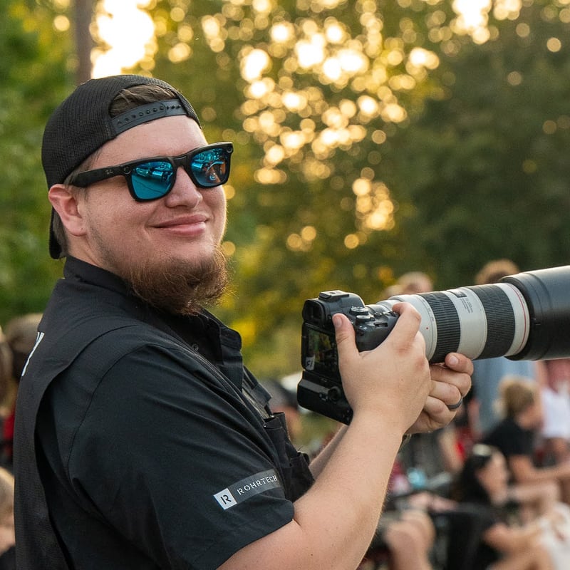 Nathaniel Rohr with a camera
